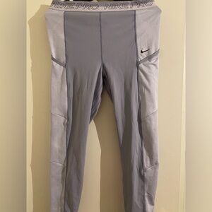 Nike pro purple leggings with pockets